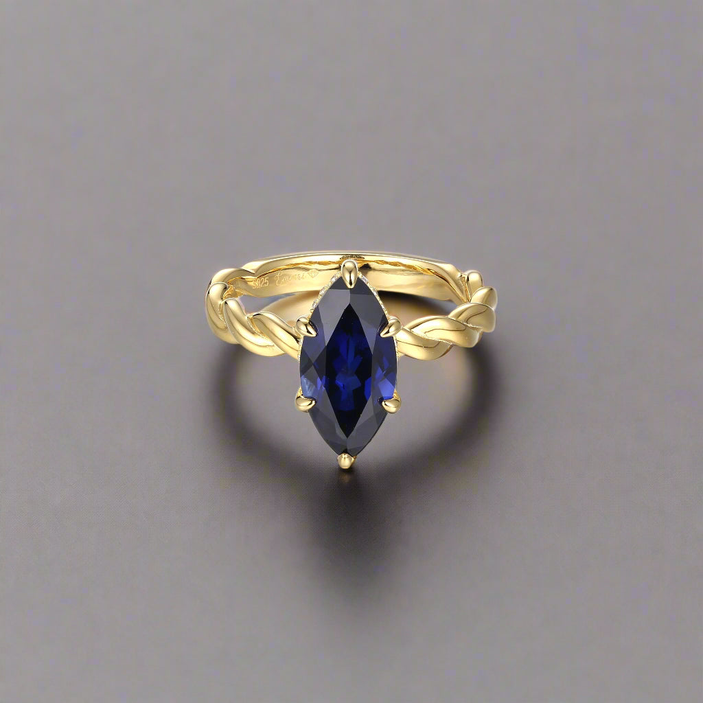 Maris – Marquise Blue Sapphire Twist Ring