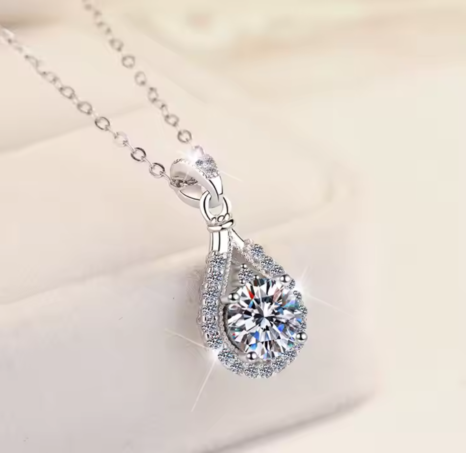 Lachryma: 1 Carat D Color VVS1 Moissanite Teardrop Halo Pendant