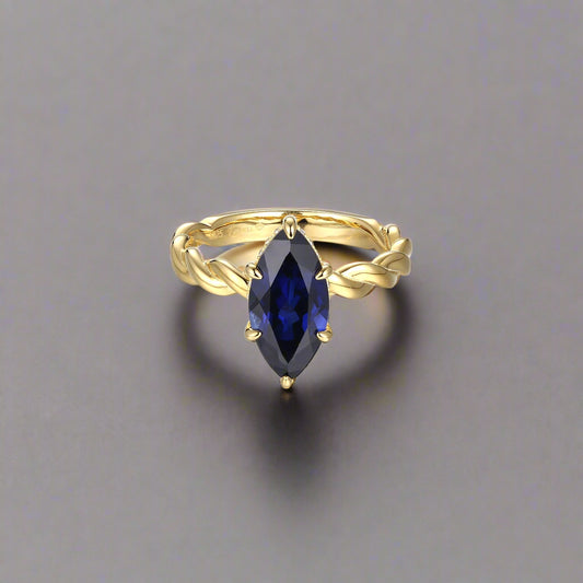 Maris – Marquise Blue Sapphire Twist Ring