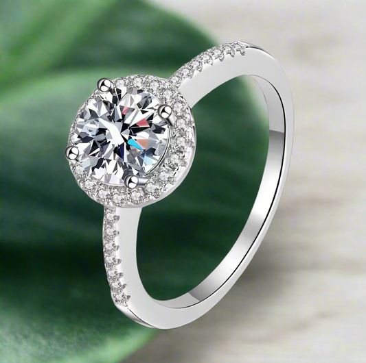 Selene: 1 Carat D Color VS2 Moissanite Ring with Heart-Detail Halo Band