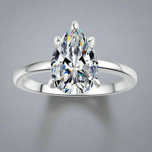 Valencia: 2 Carat D Color VVS1 Moissanite Ring with Pear Cut Solitaire Design