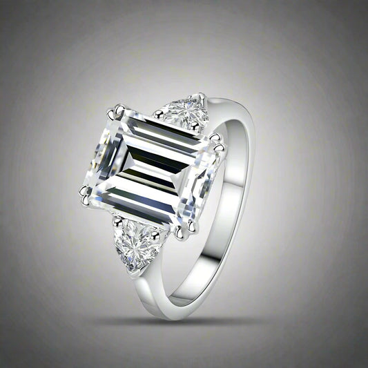 Regal: 4 Carat D Color VVS1 Emerald Cut Moissanite Ring